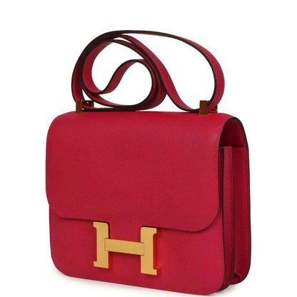 Red leather handbag with gold-tone H clasp and side gusset detail