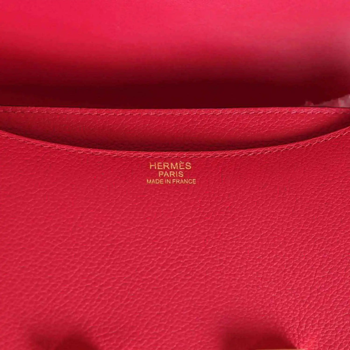 Red leather interior panel with Hermes Paris and Made in France stamp