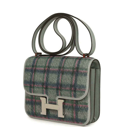 Tartan plaid leather mini handbag with silver H clasp and side profile, green-blue