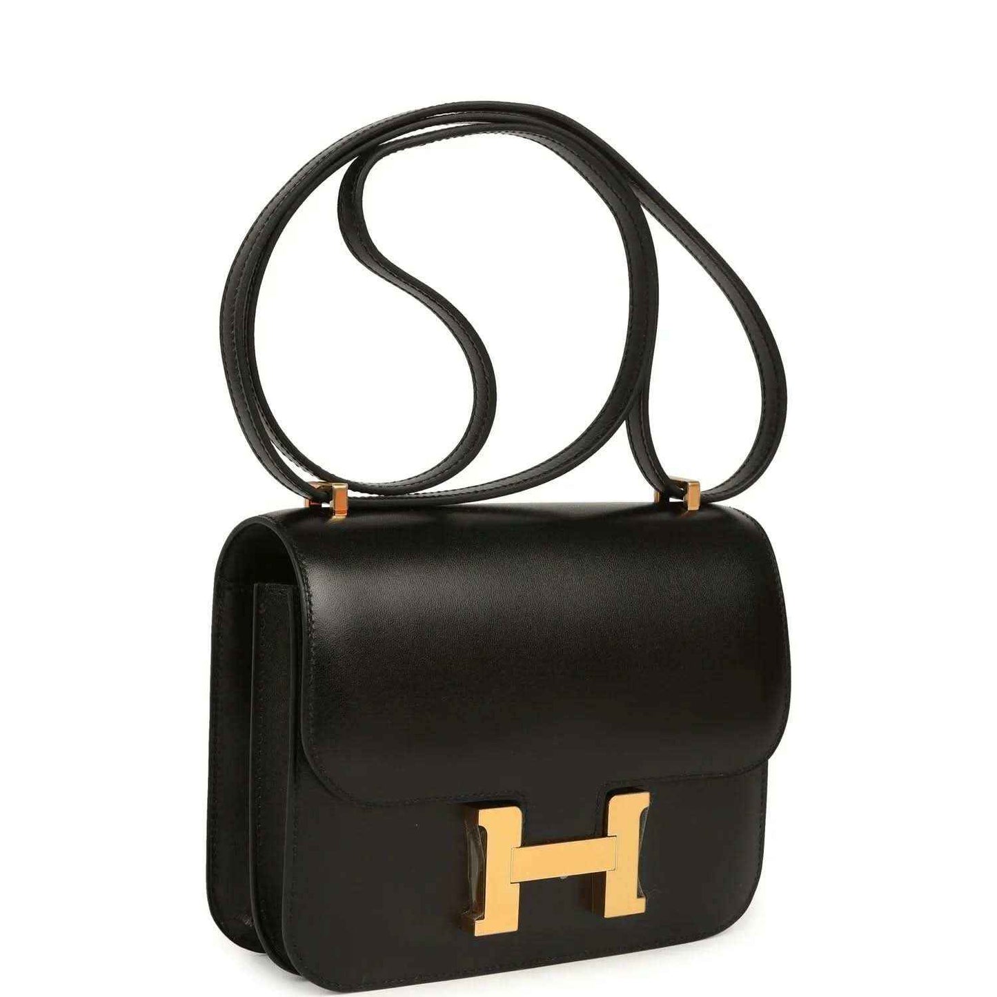 Black calfskin handbag with curved flap, gold-tone H clasp, and shoulder strap