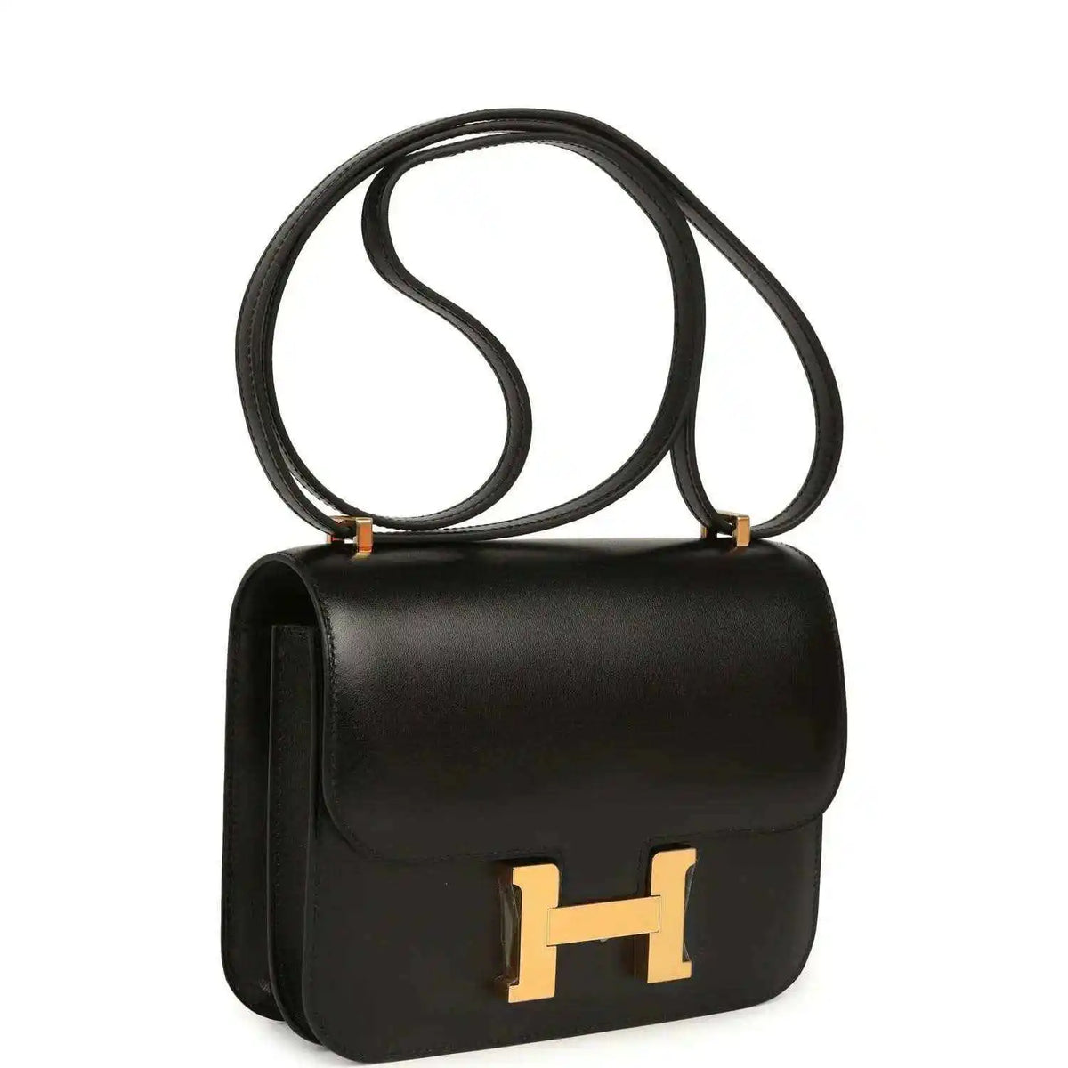 Black calfskin handbag with curved flap, gold-tone H clasp, and shoulder strap