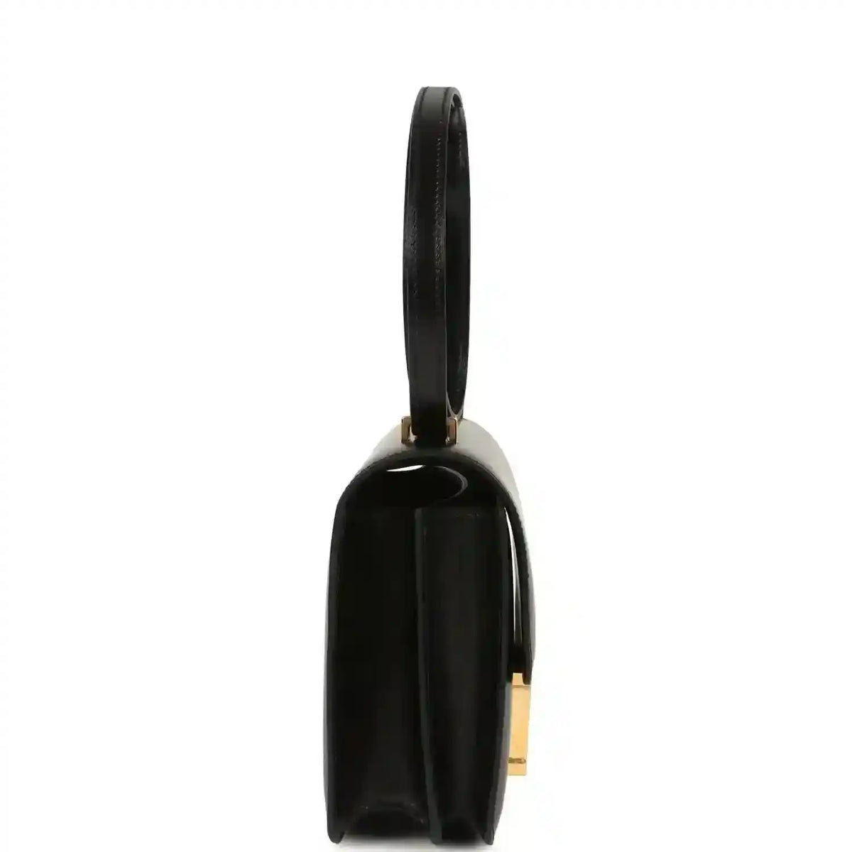 Black calfskin handbag with slim side profile and gold-tone hardware on strap