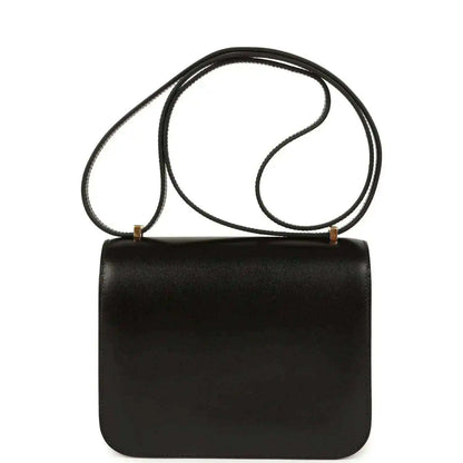 Black calfskin handbag with top handle strap and structured rectangular body