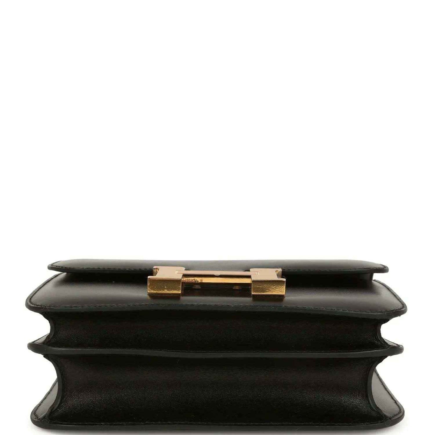 Black calfskin handbag top view with gold-tone clasp on the front flap