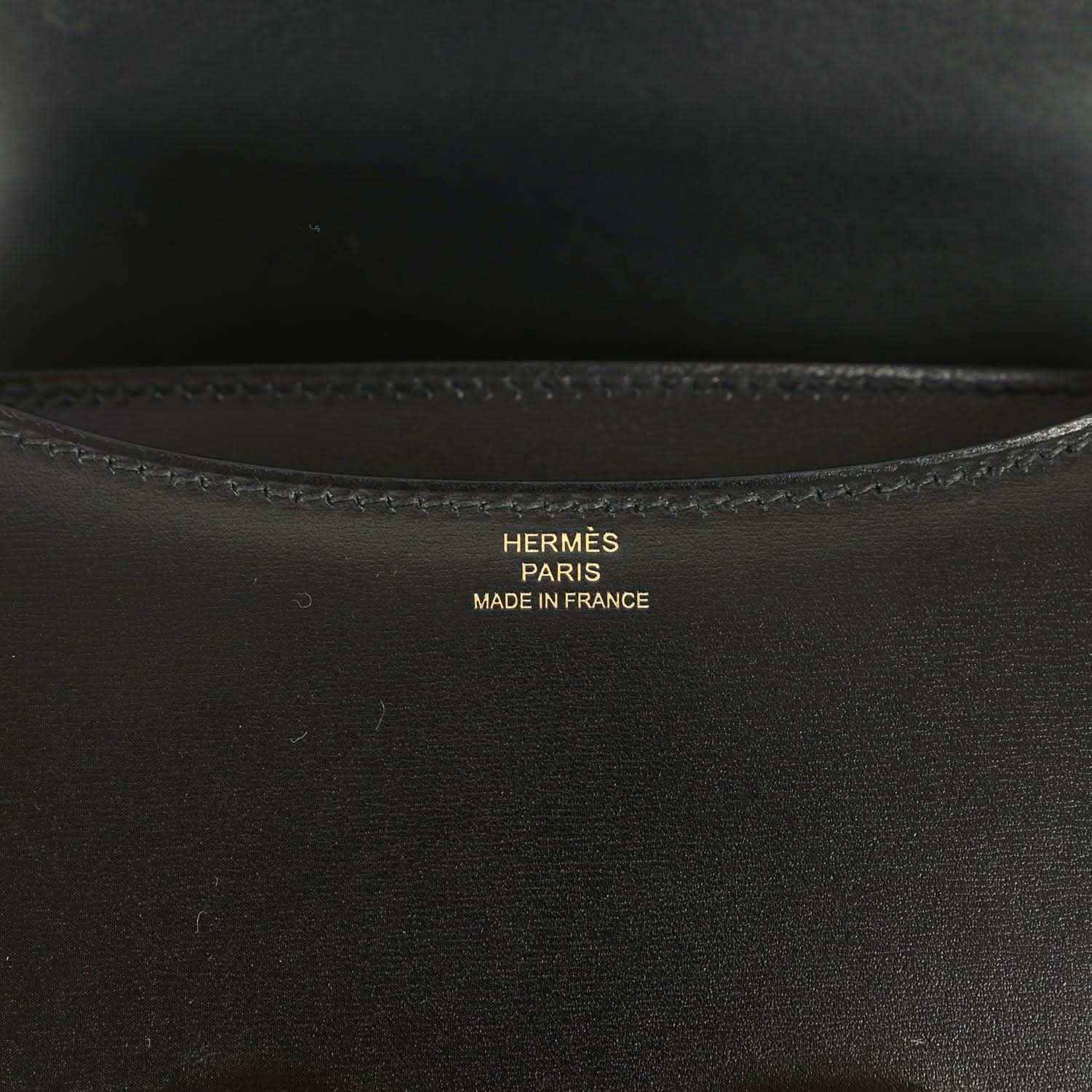 Black calfskin handbag interior with Hermes Paris stamp and stitched trim