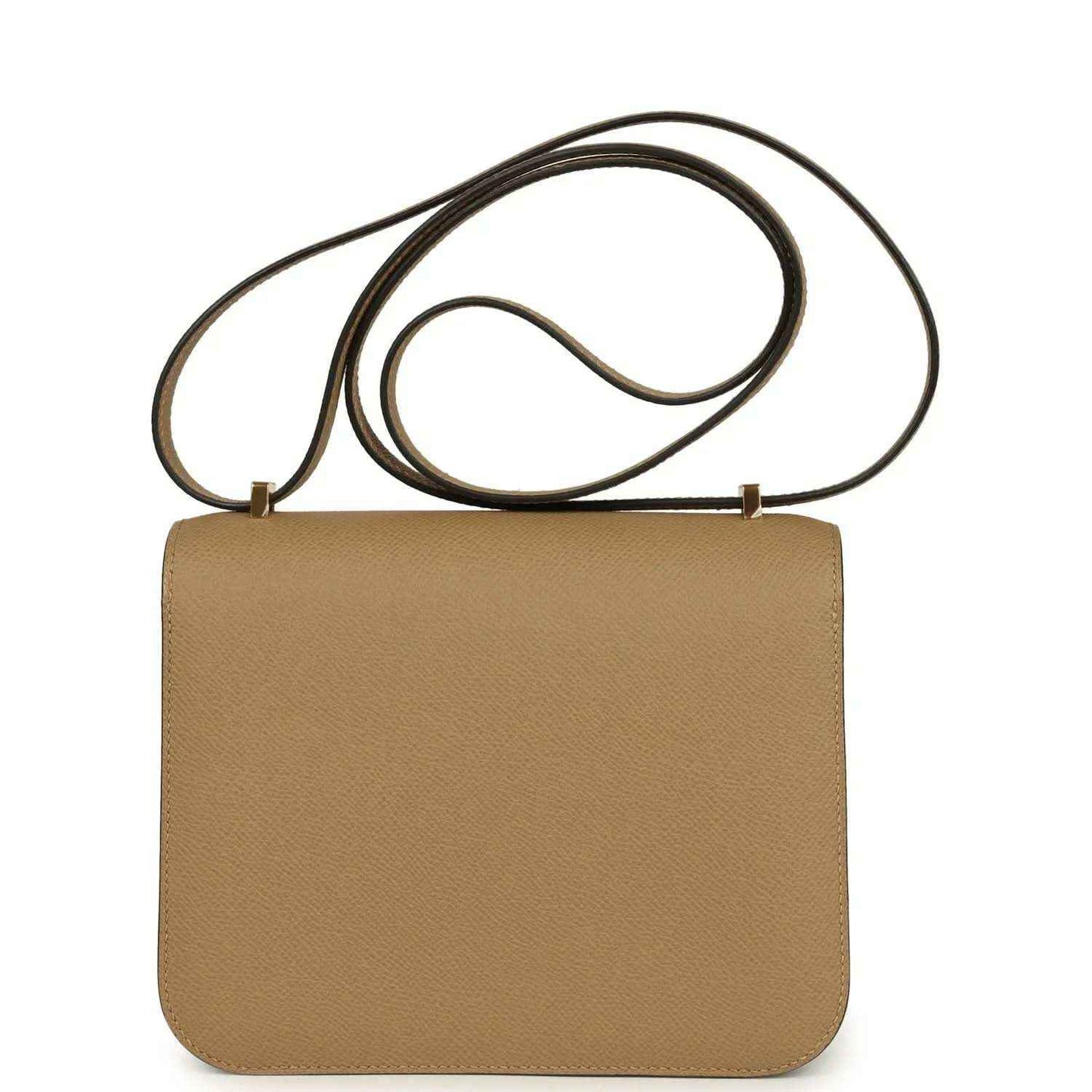 Tan leather crossbody bag with back view flap and gold-tone closure hardware, strap