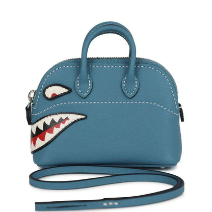Hermes shark bag charm in blue leather, top handle, front zipper and appliqué