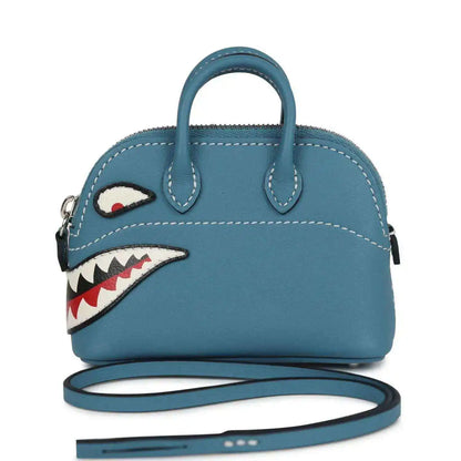Hermes shark bag charm in blue leather, top handle, front zipper and appliqué