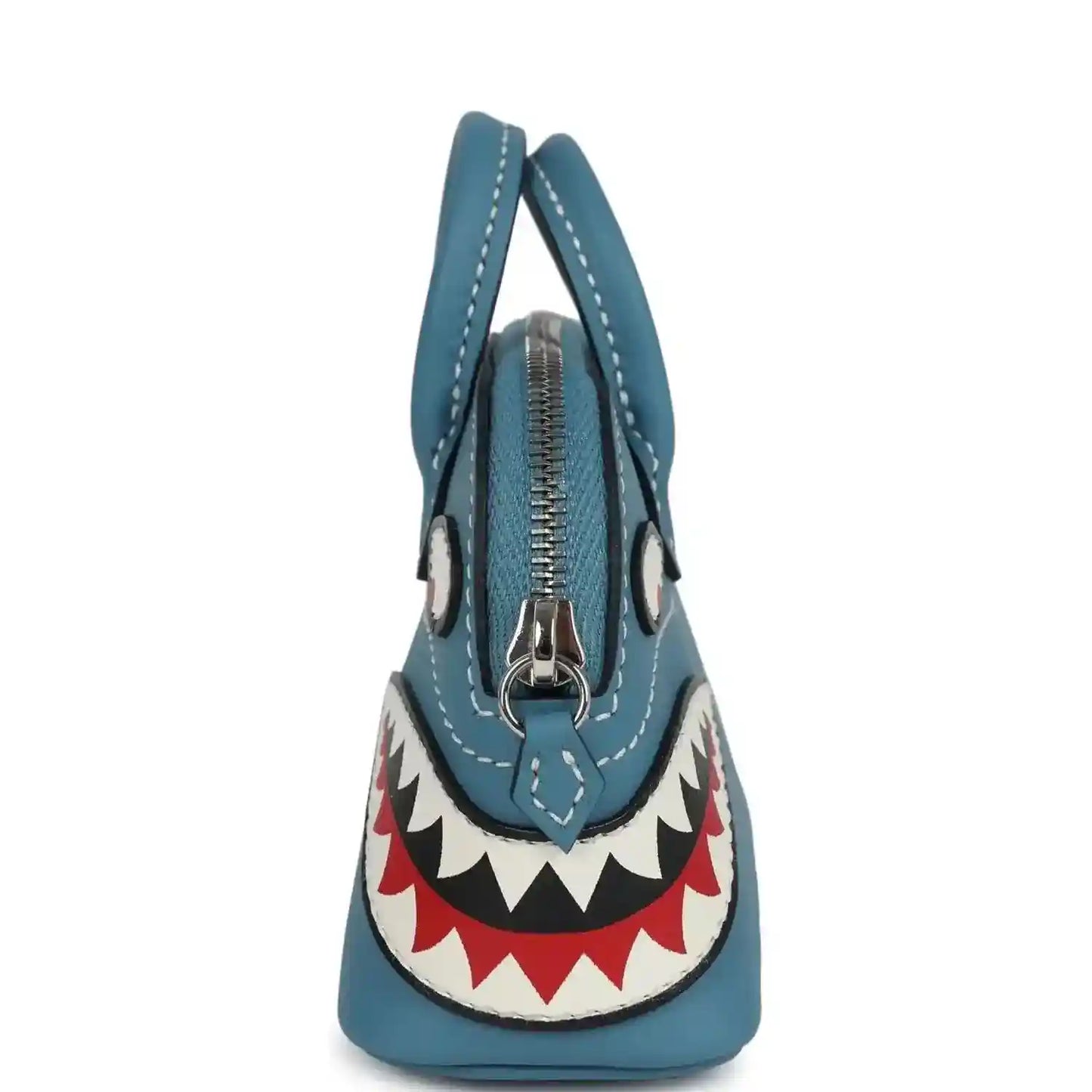 Hermes shark bag charm in blue leather with front zipper and hanging shark applique