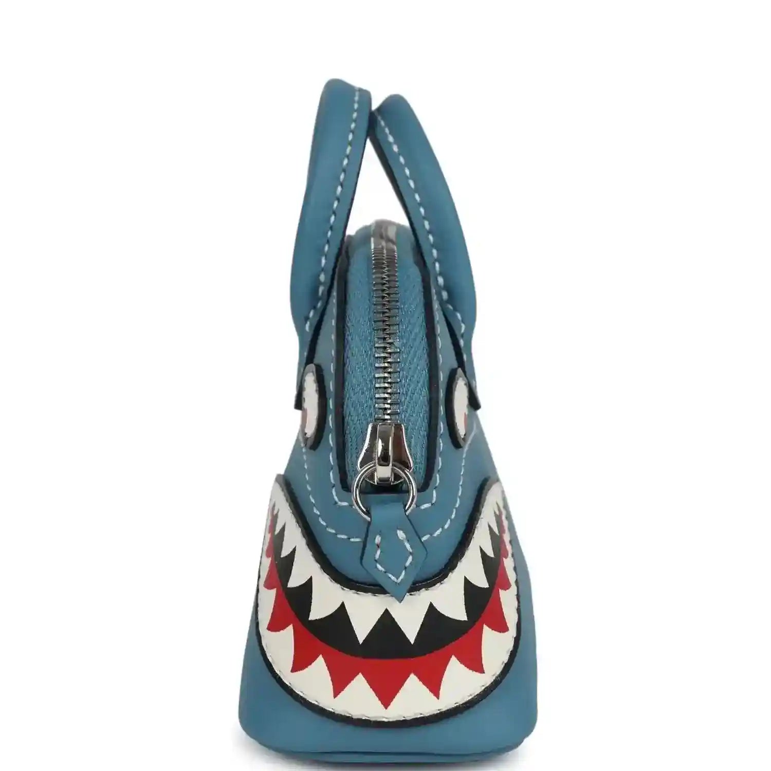 Hermes shark bag charm in blue leather with front zipper and hanging shark applique