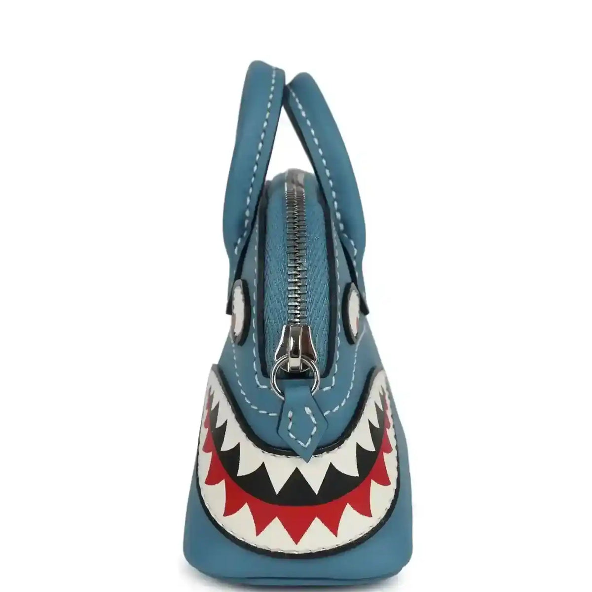 Hermes shark bag charm in blue leather with front zipper and hanging shark applique