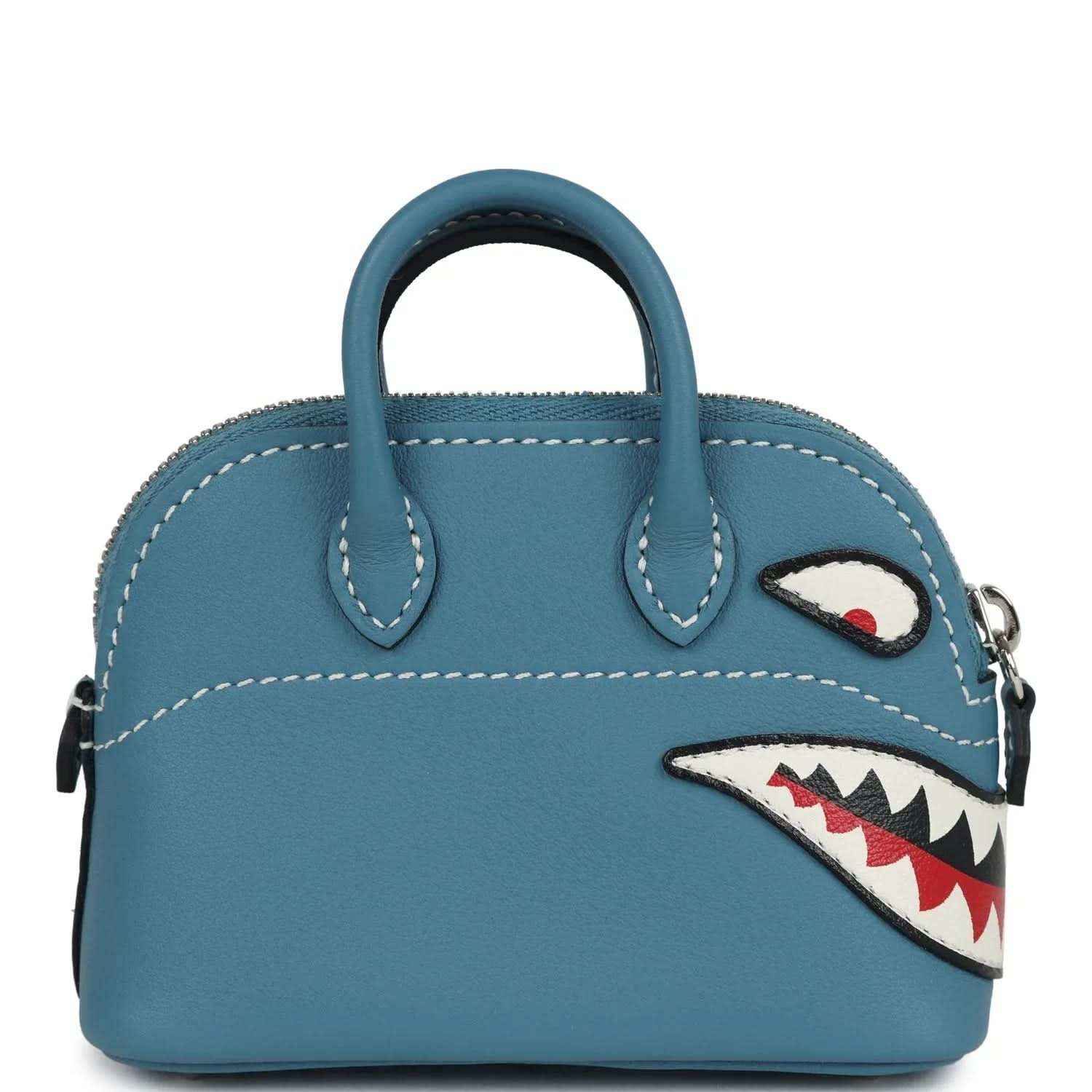 Hermes shark bag charm in blue leather, front view with shark applique and top handle