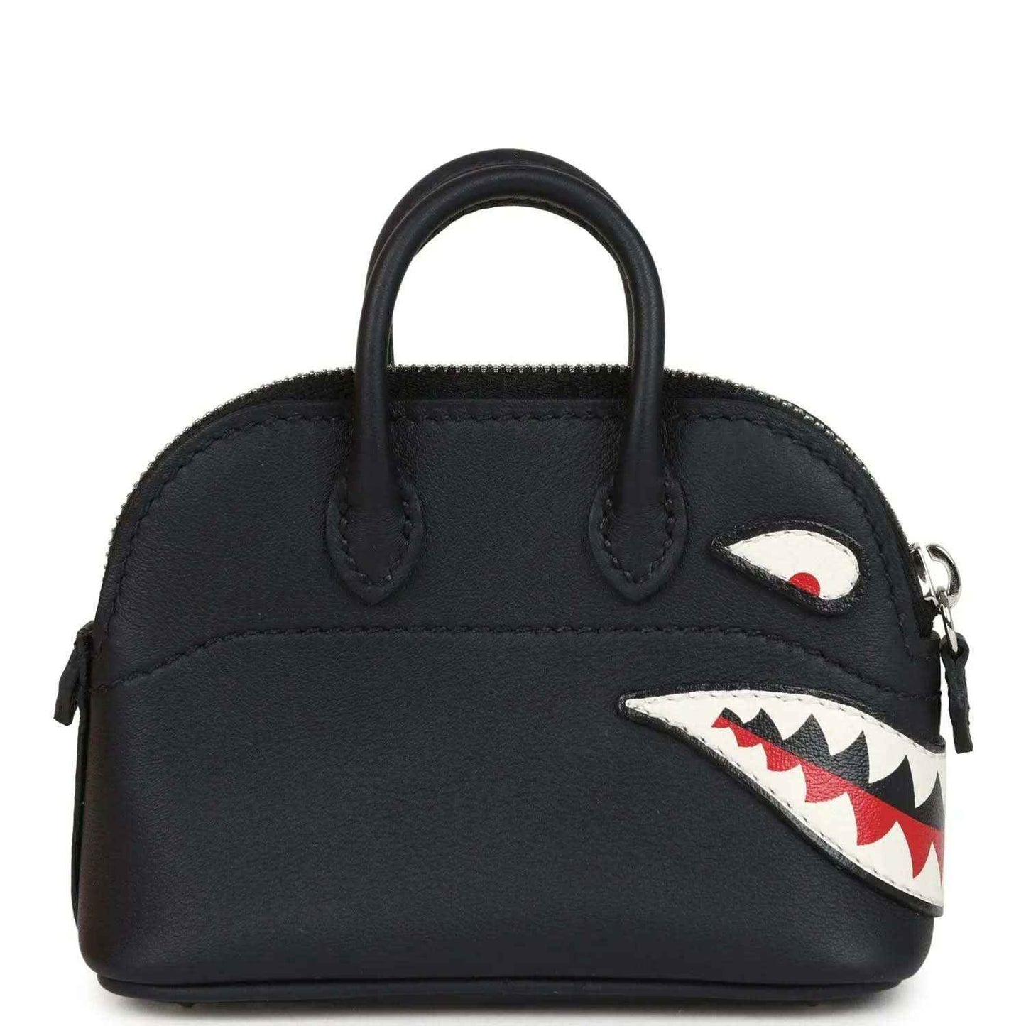 Black mini bag charm with top handles and shark mouth applique with eye patch
