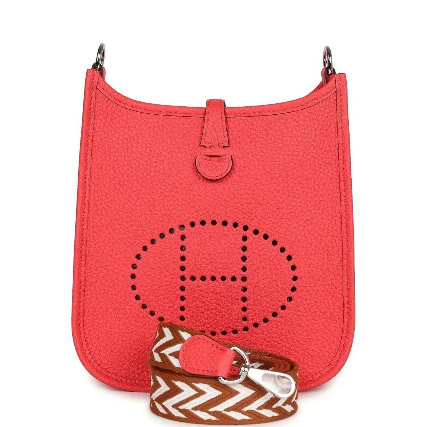 Red leather mini handbag with perforated E logo patch and top handle.