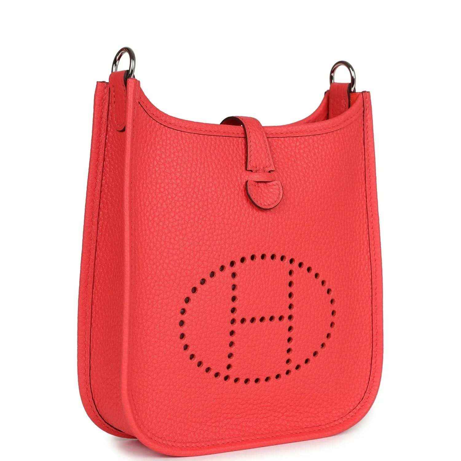 Red leather mini handbag with perforated E logo front and top handles.