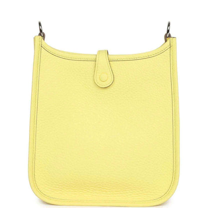 Lemon-yellow leather shoulder bag with top handle and smooth front