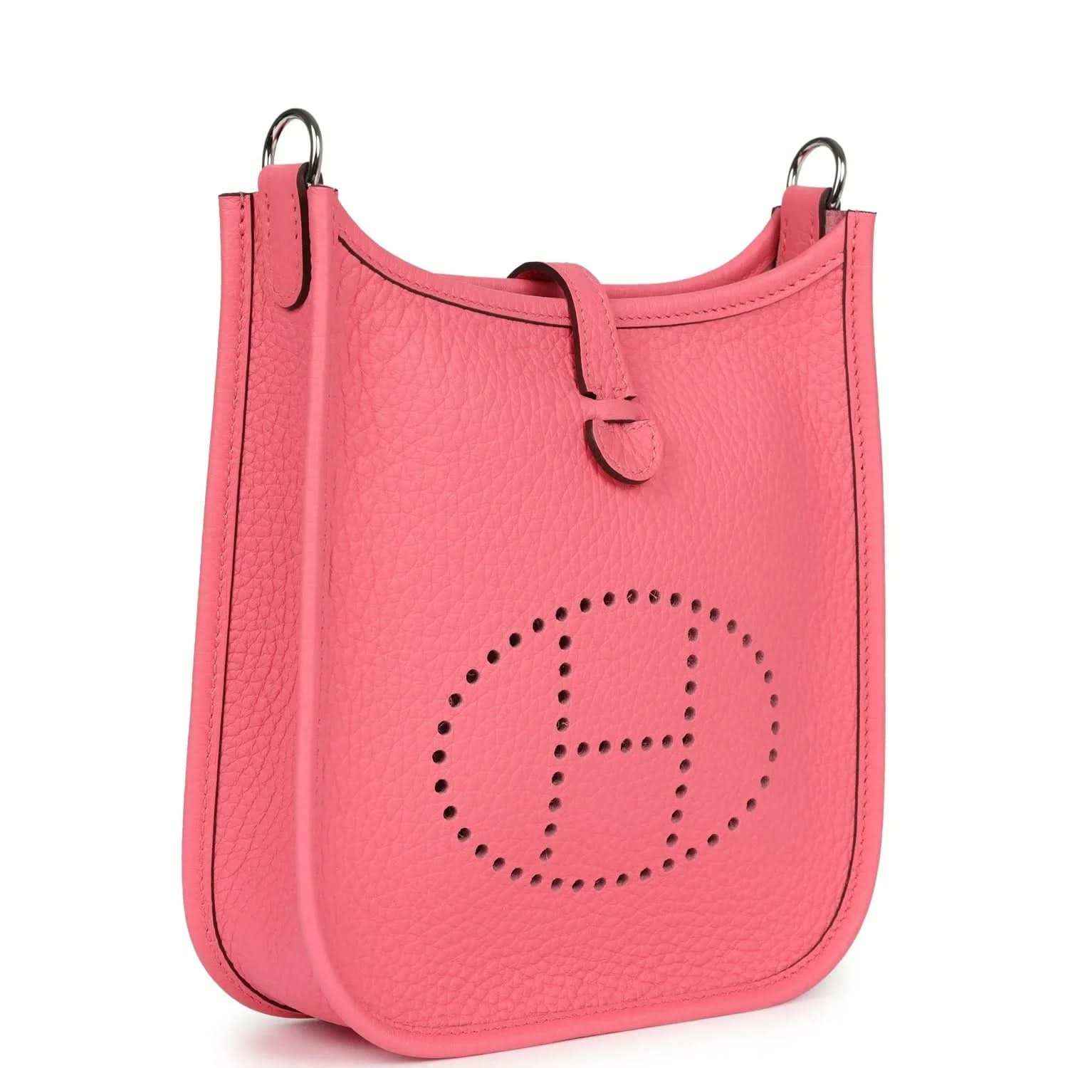 Pink Clemence leather Evelyne TPM crossbody bag with perforated logo, side view