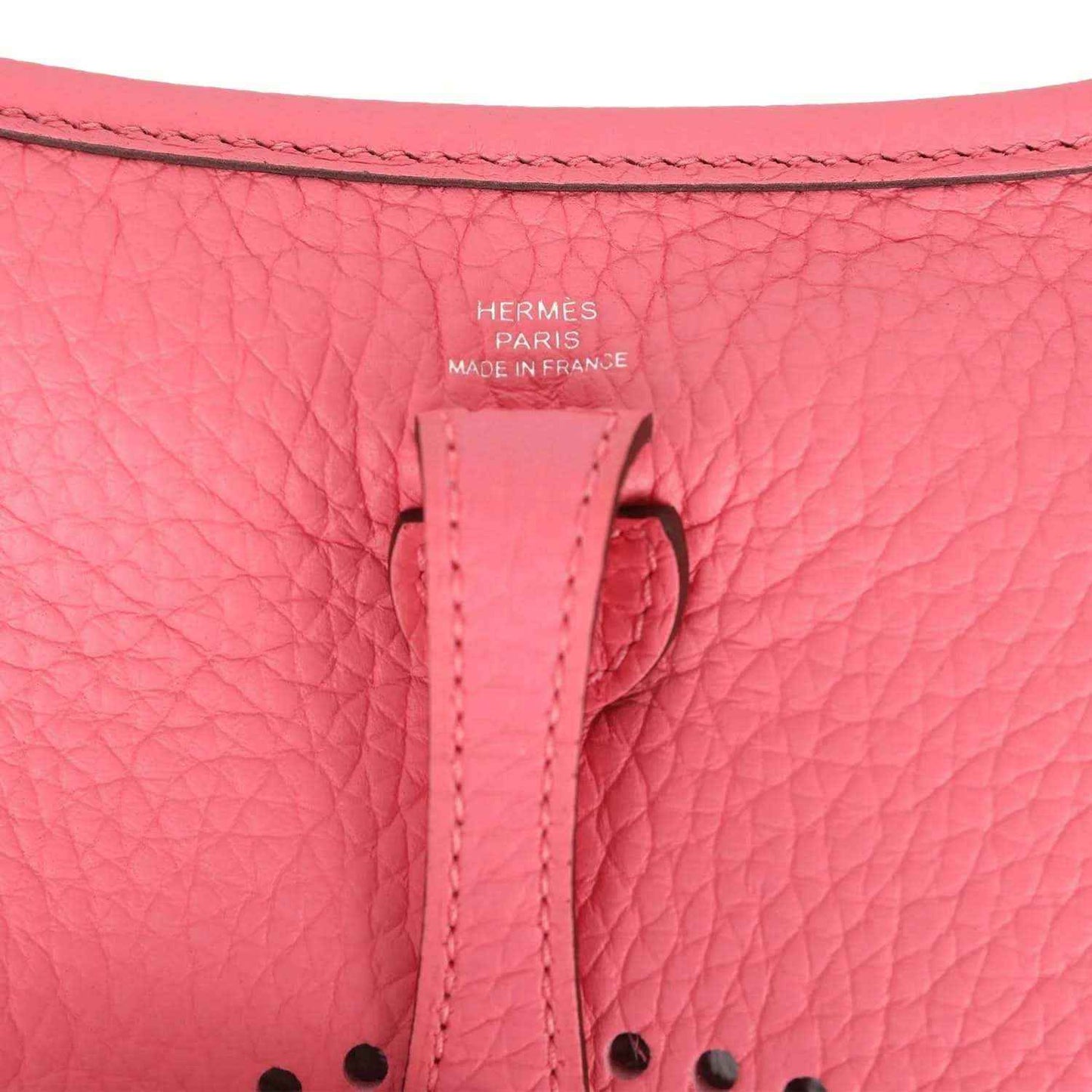 Pink leather Evelyne TPM crossbody bag strap stitching and Hermes stamp detail