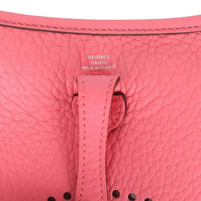 Pink leather Evelyne TPM crossbody bag strap stitching and Hermes stamp detail