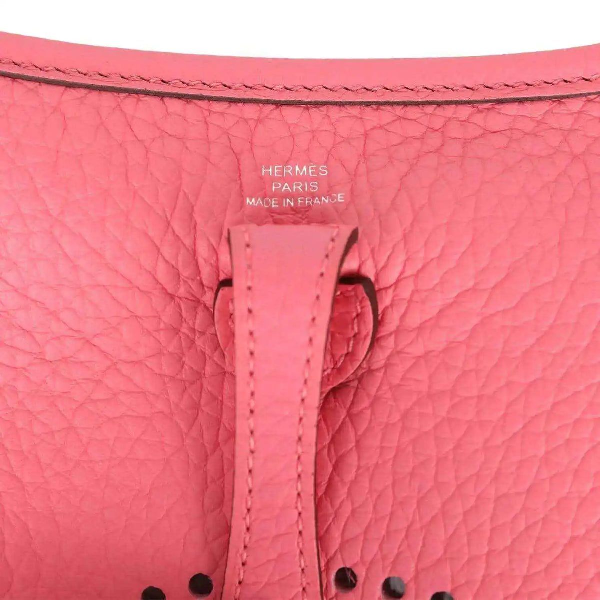 Pink leather Evelyne TPM crossbody bag strap stitching and Hermes stamp detail