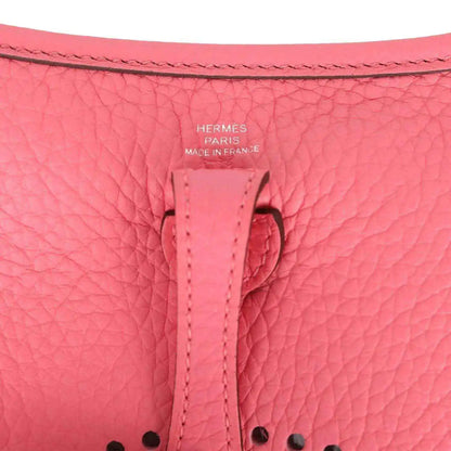 Pink leather Evelyne TPM crossbody bag strap stitching and Hermes stamp detail