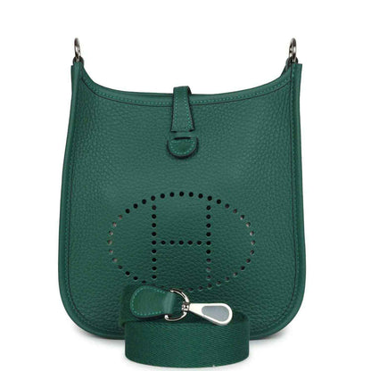 Green textured leather Evelyne TPM mini shoulder bag with front perforated logo