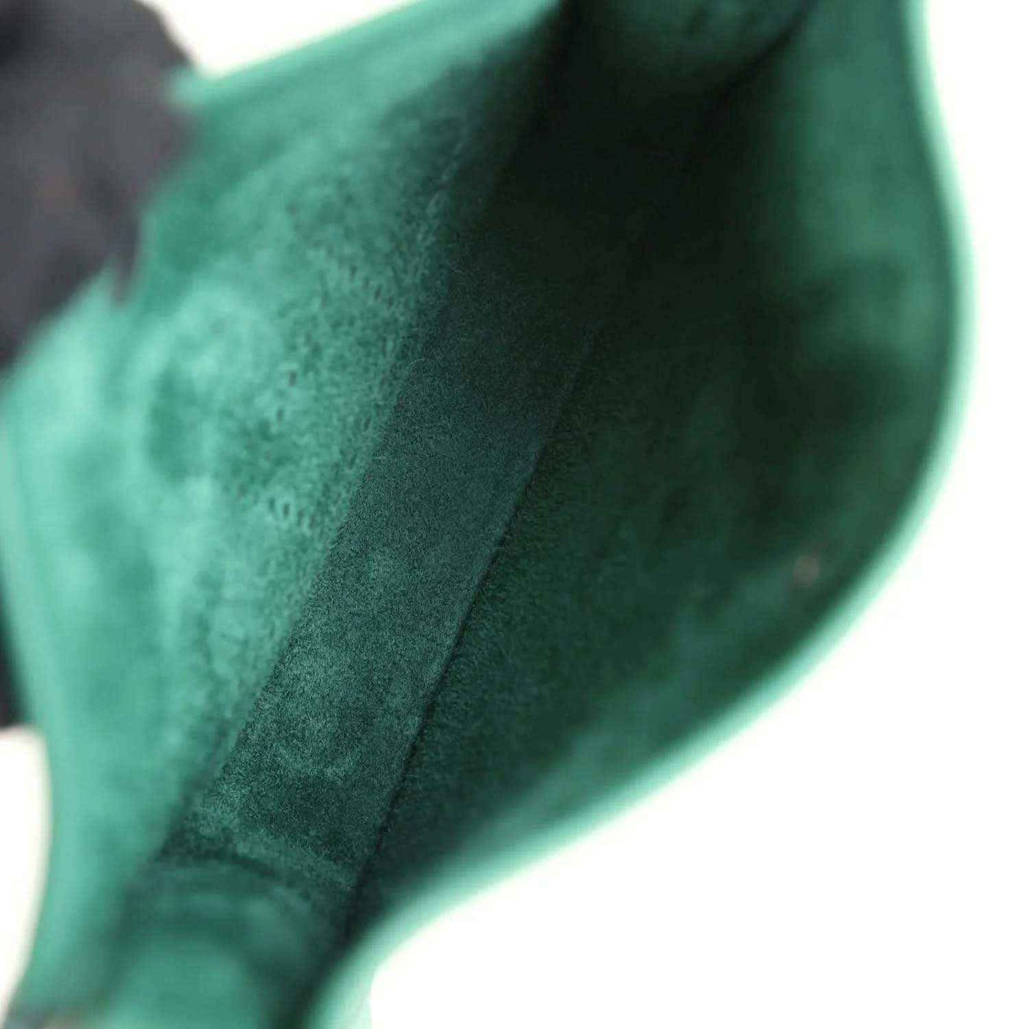 Green suede-lined Evelyne TPM mini shoulder bag interior close-up