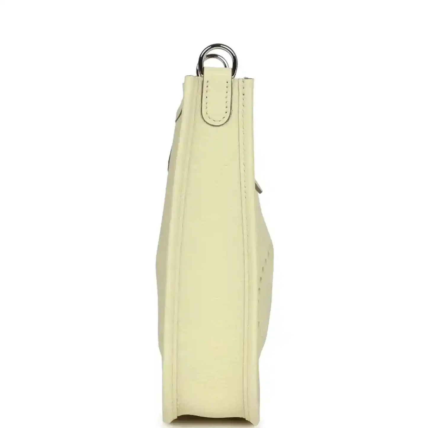 Light yellow leather mini crossbody bag, vertical side view with loop handle