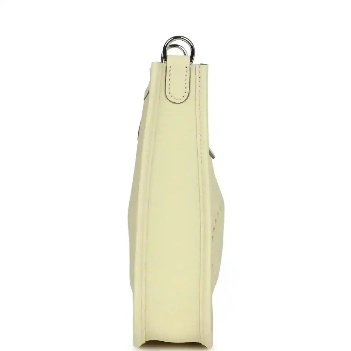 Light yellow leather mini crossbody bag, vertical side view with loop handle