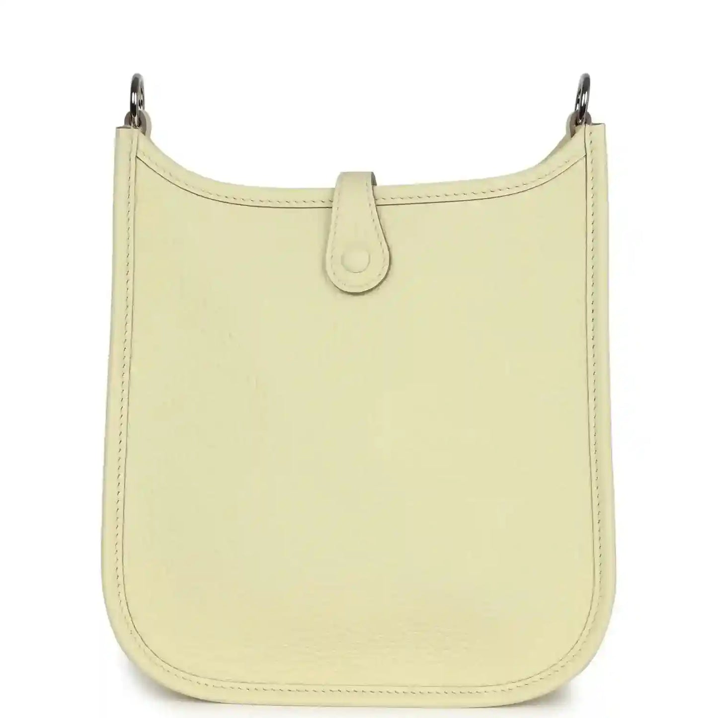 Light yellow leather mini crossbody bag with clean front panel and top loop