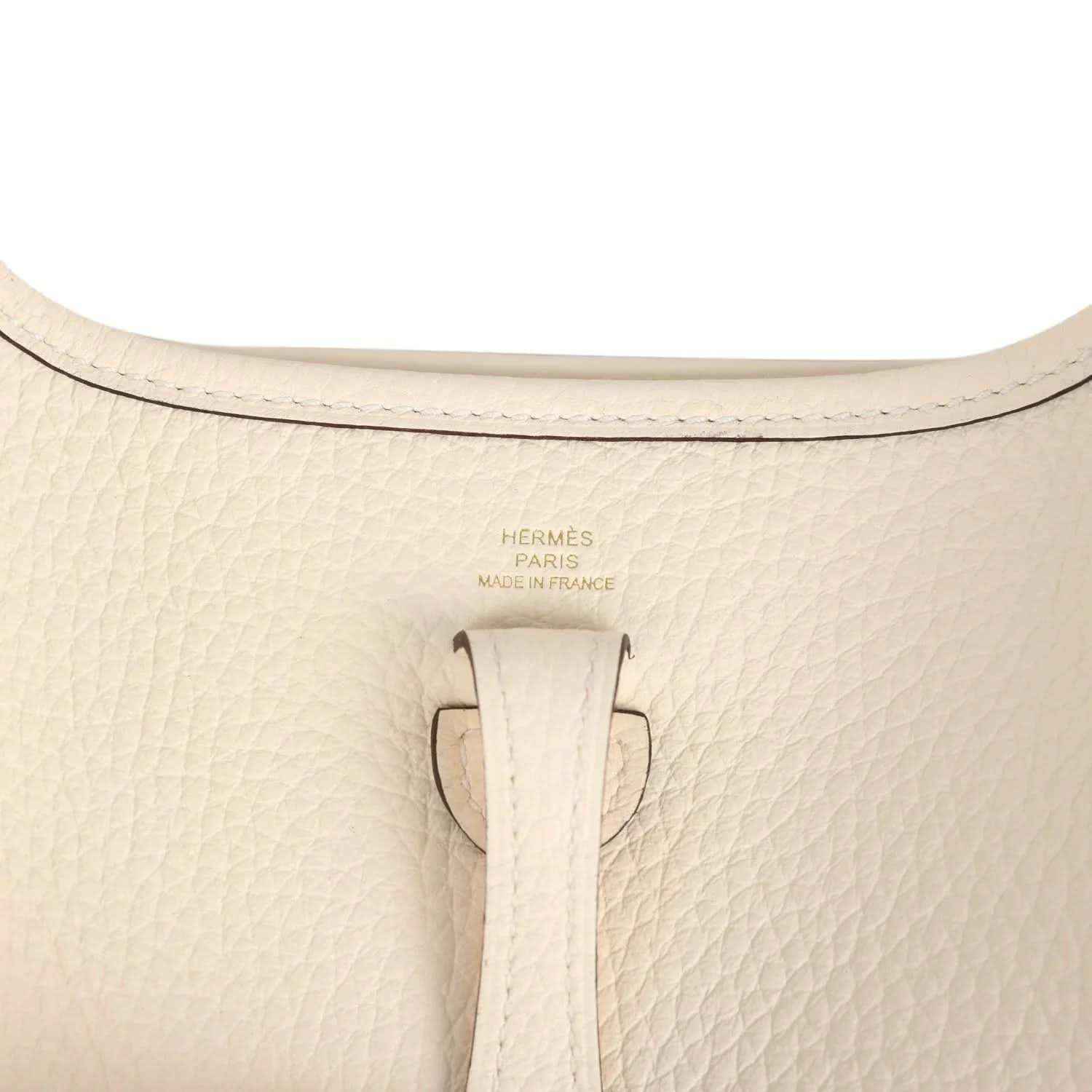 Beige textured leather top with 'Hermès Paris Made in France' stamp