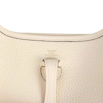 Beige textured leather top with 'Hermès Paris Made in France' stamp