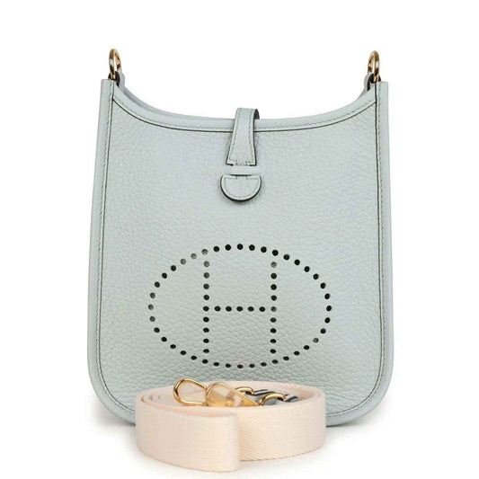 Hermès Evelyne TPM bag in pale blue grained leather with palladium-tone rings and logo
