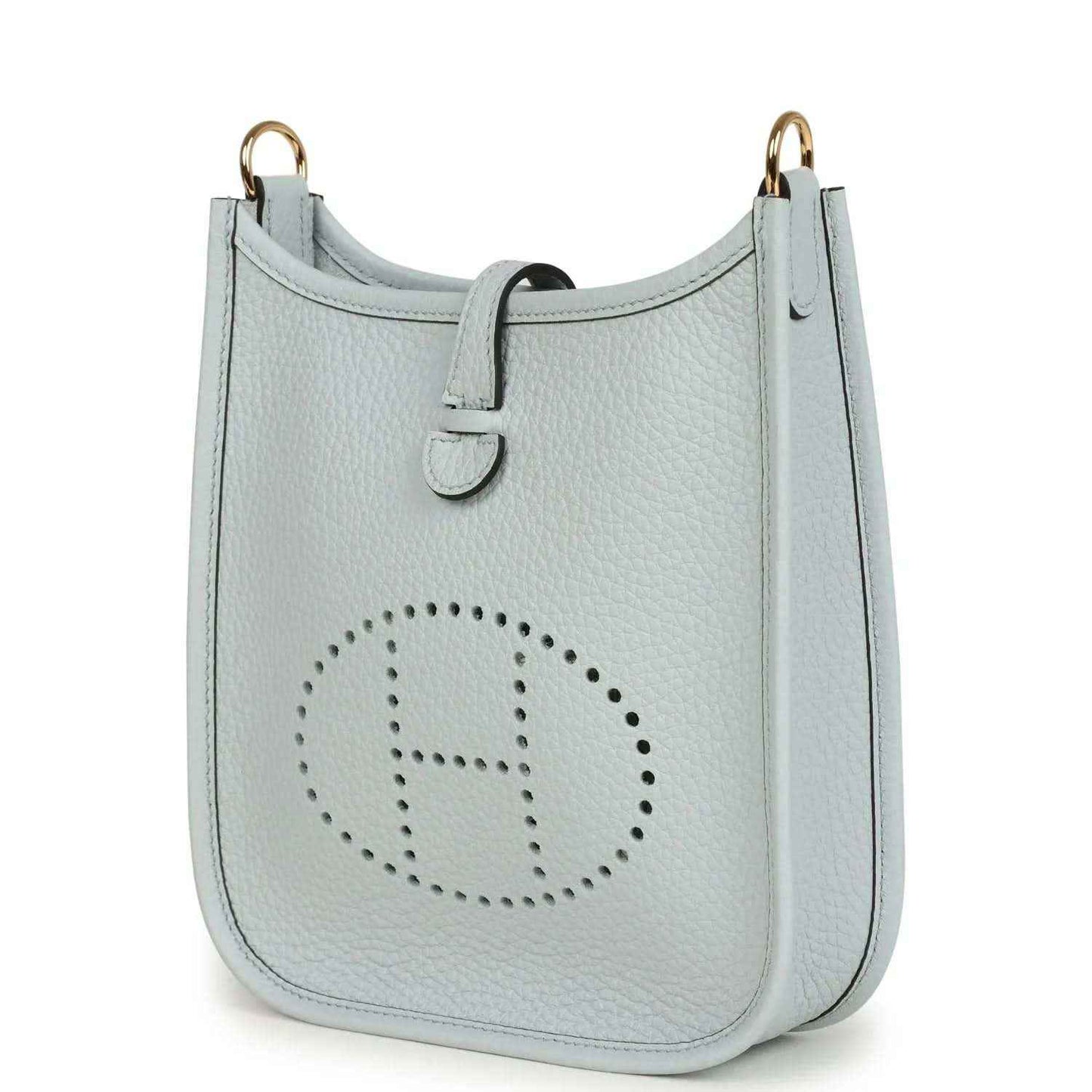 Evelyne TPM bag in pale blue grained leather with centered dotted logo on front
