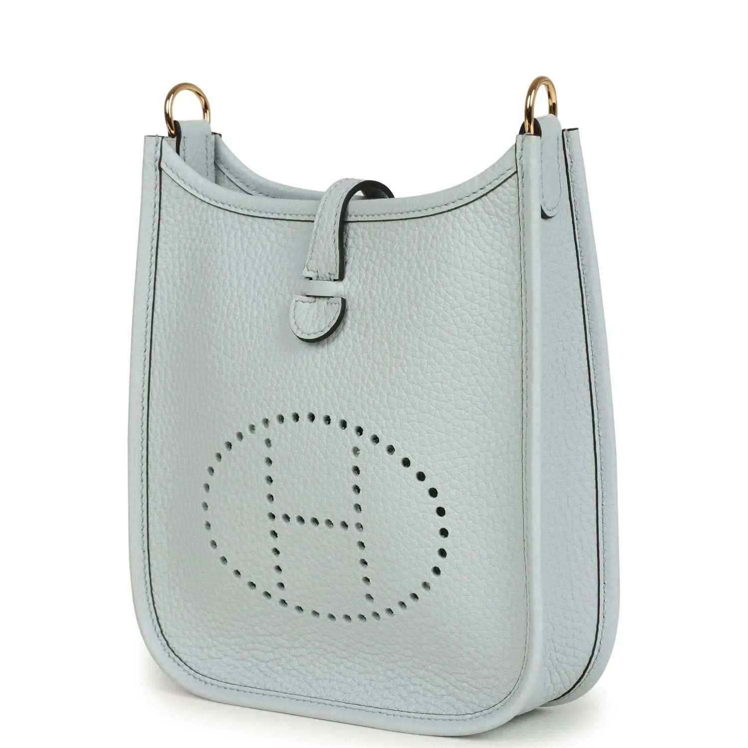 Evelyne TPM bag in pale blue grained leather with centered dotted logo on front
