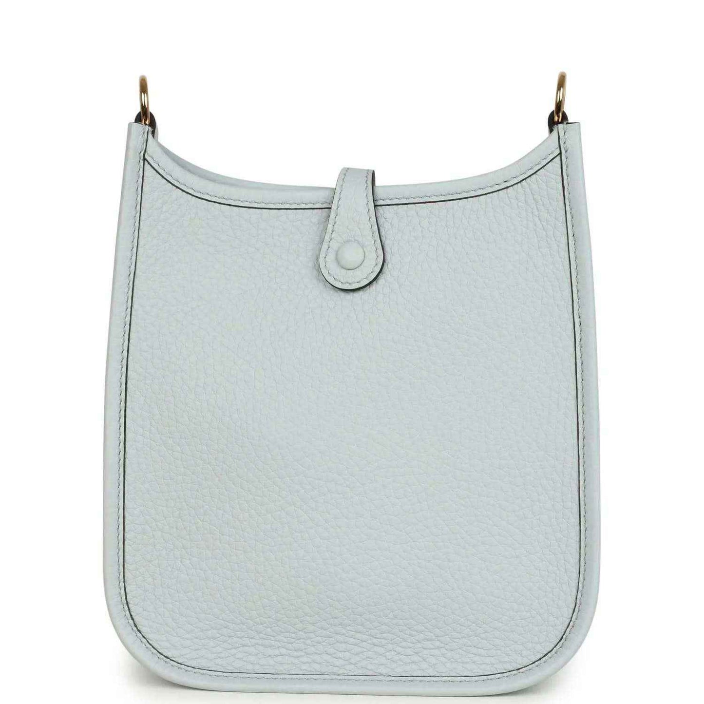 Evelyne TPM bag in pale blue grained leather with front tab and top loop handle