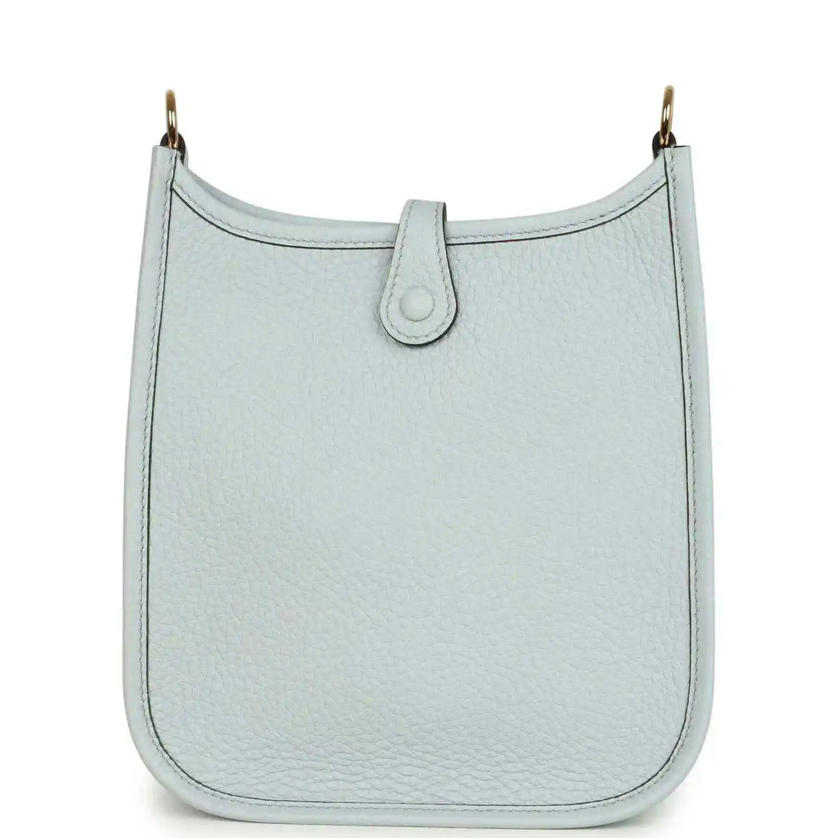 Evelyne TPM bag in pale blue grained leather with front tab and top loop handle