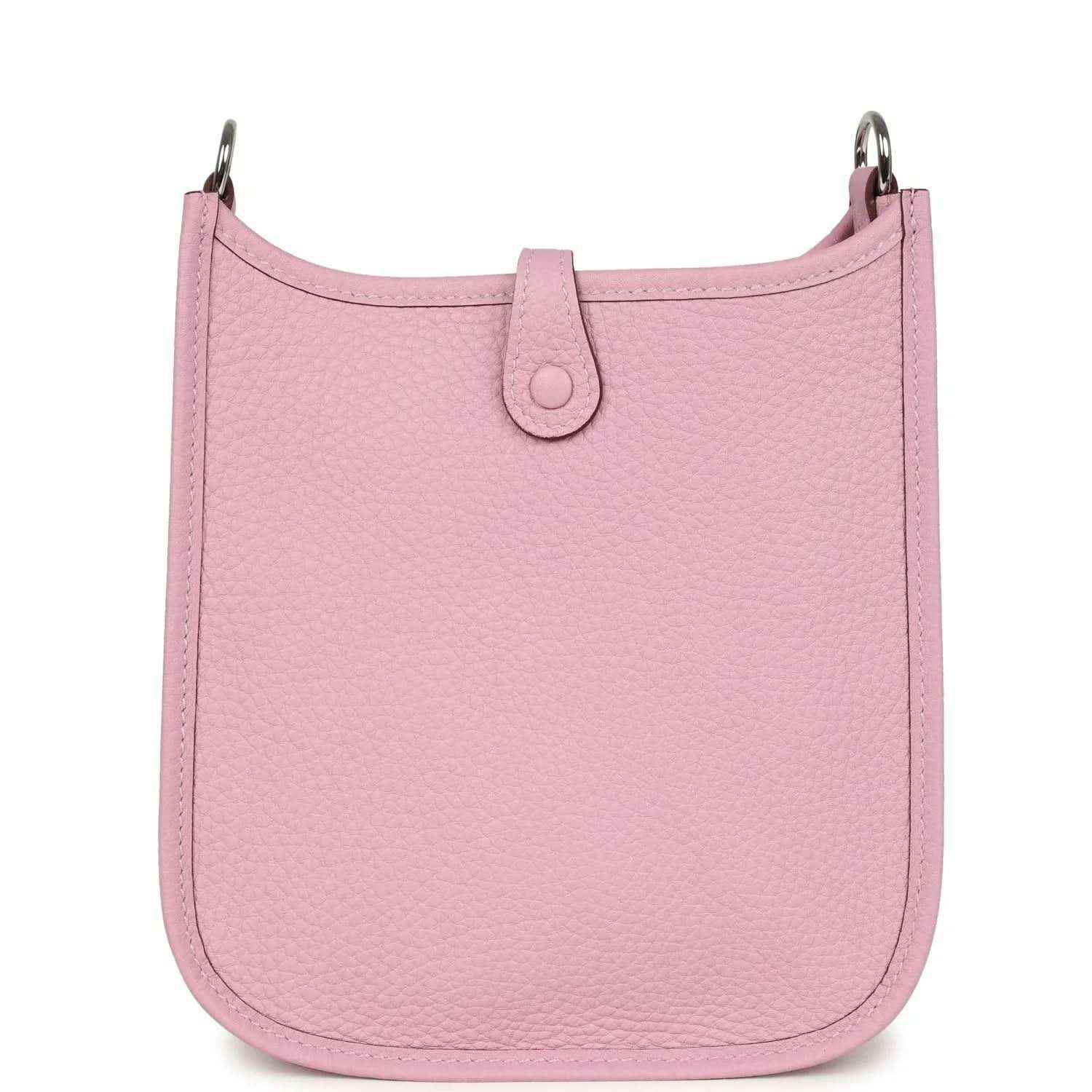 Mauve-pink leather crossbody bag front view with centered strap tab and top rings