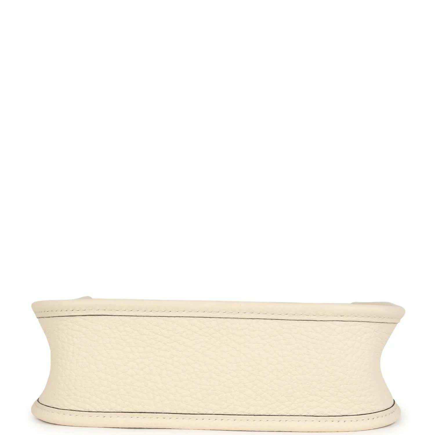 Cream textured leather bag base with smooth trim edge