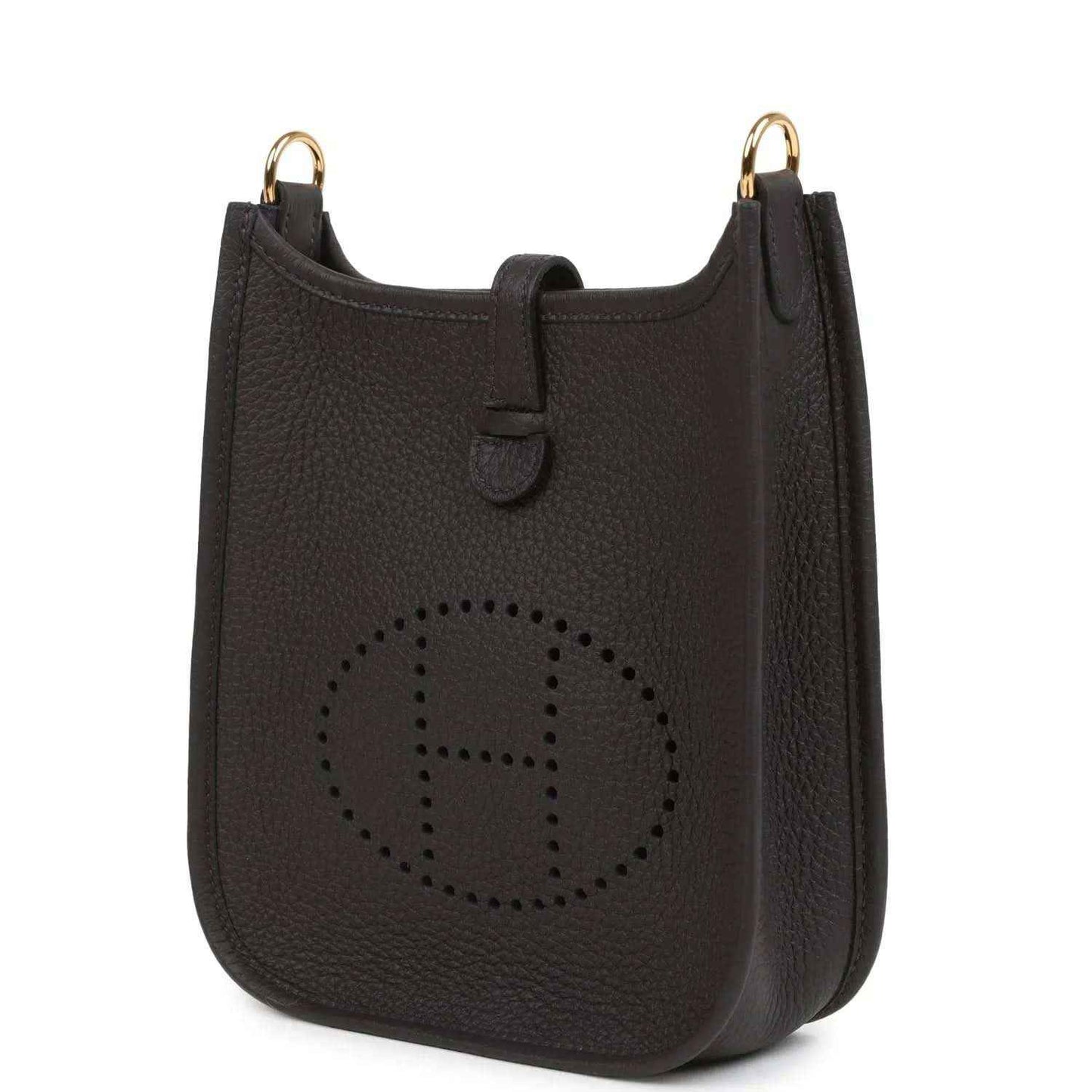 Black leather Evelyne TPM bag angled view with perforated logo and gold-tone top rings.