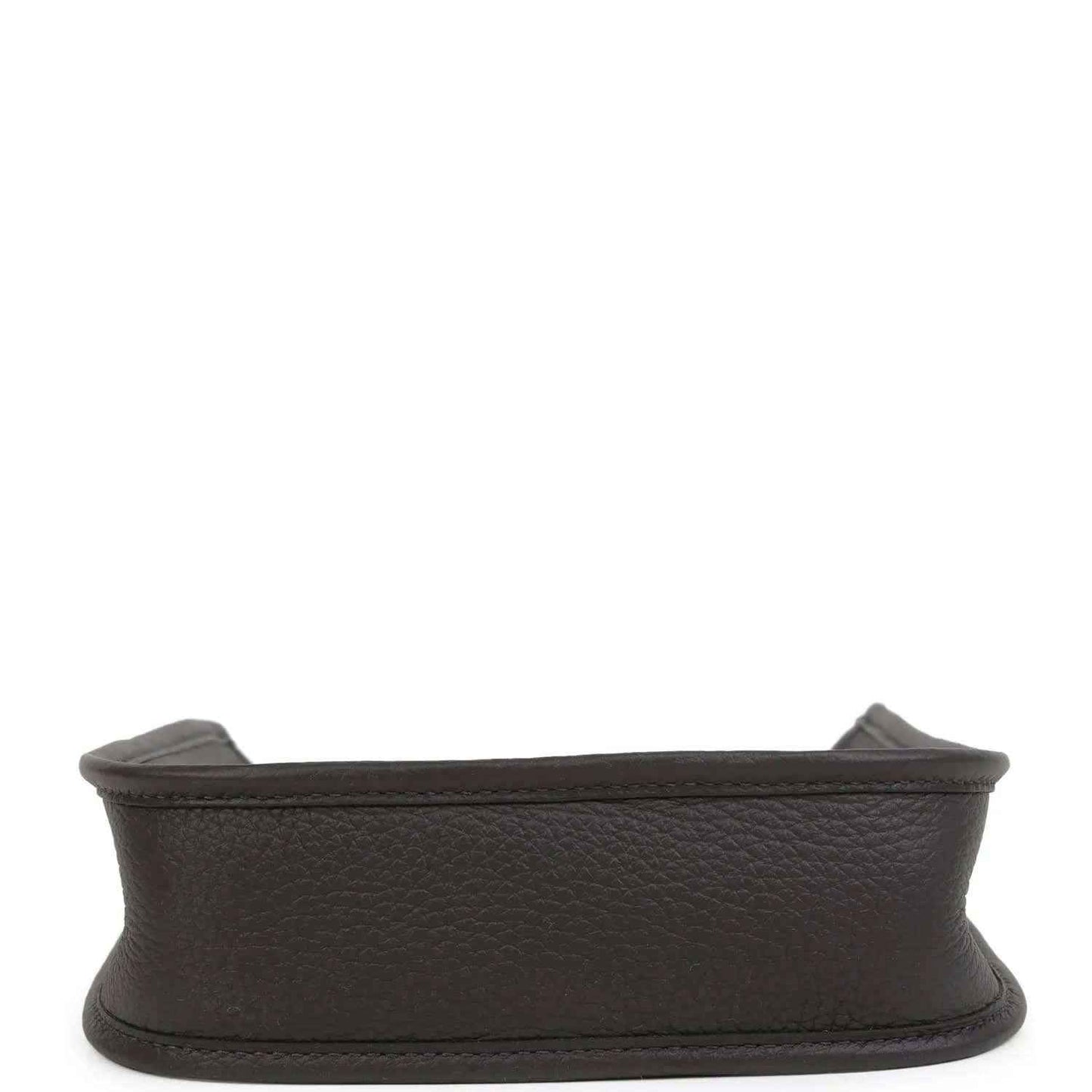 Black leather Evelyne TPM bag bottom edge with fabric lining visible at opening.