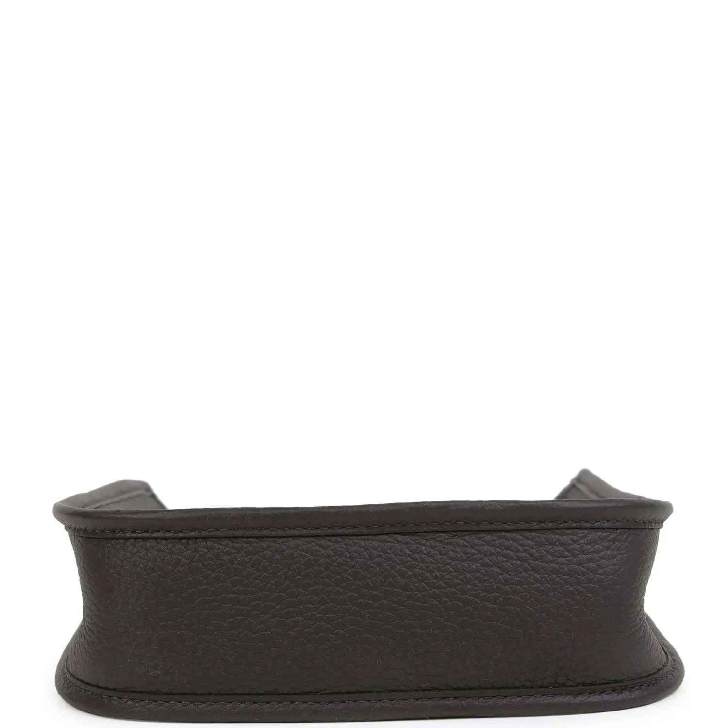 Black leather Evelyne TPM bag bottom edge with fabric lining visible at opening.