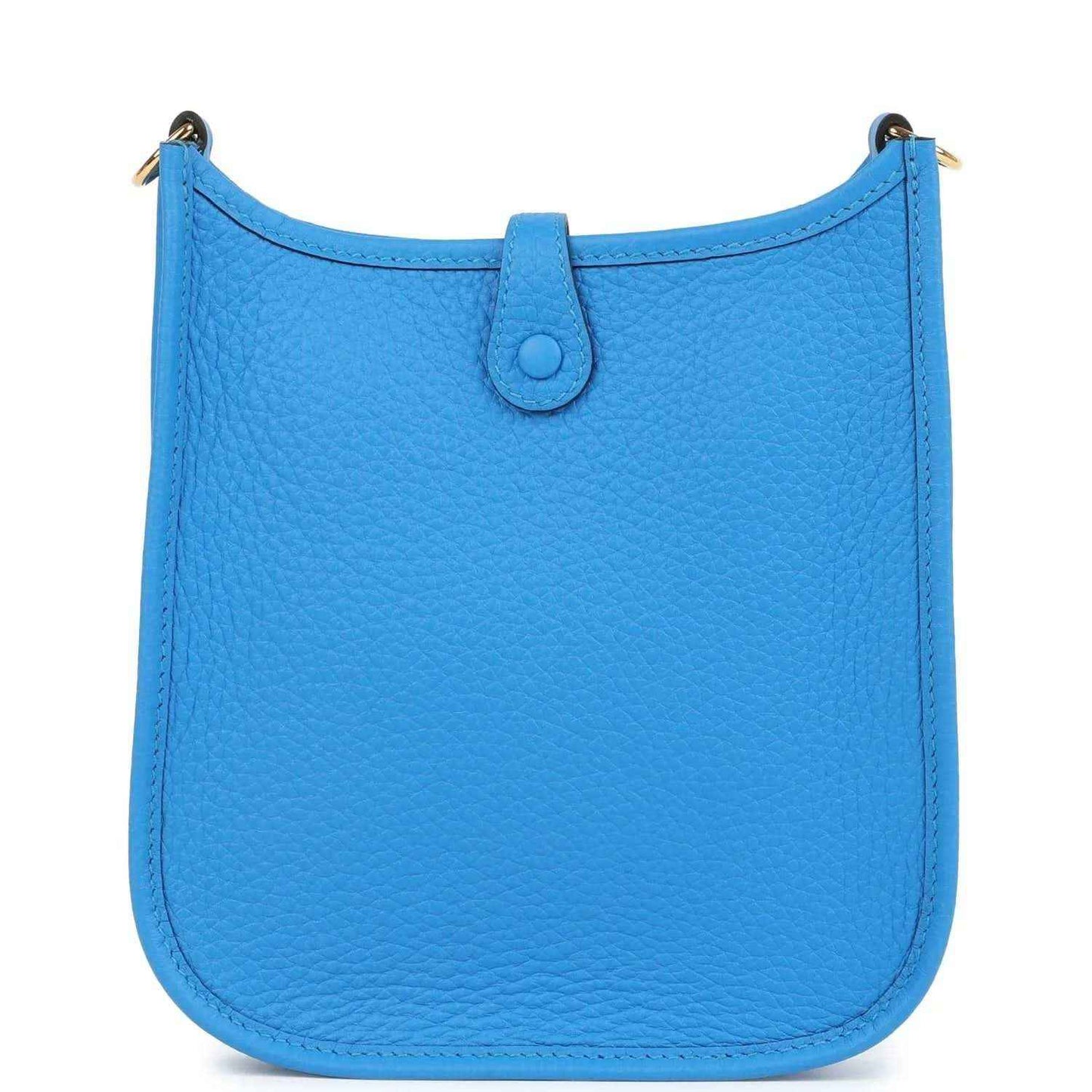 Blue leather Evelyne TPM style crossbody bag with smooth front panel and top flap closure.