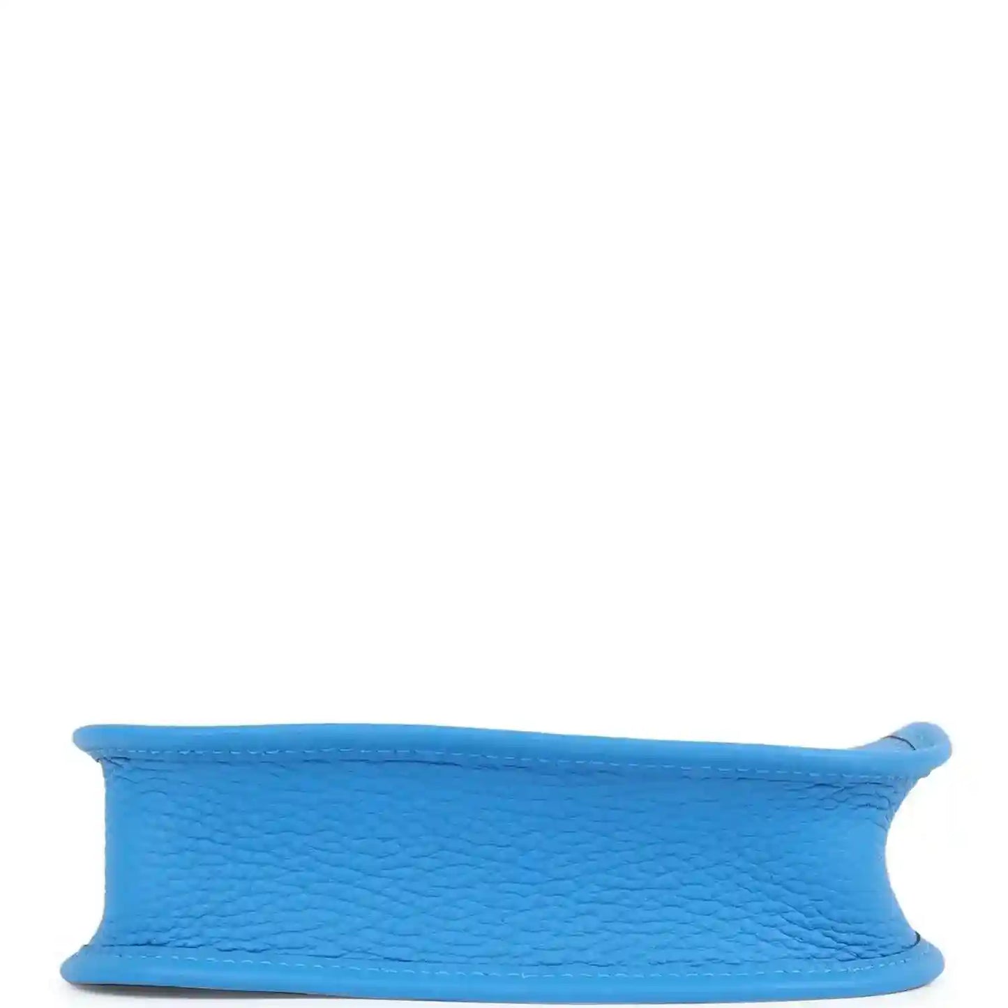Blue leather Evelyne TPM style bag bottom view with rounded edge and smooth finish.