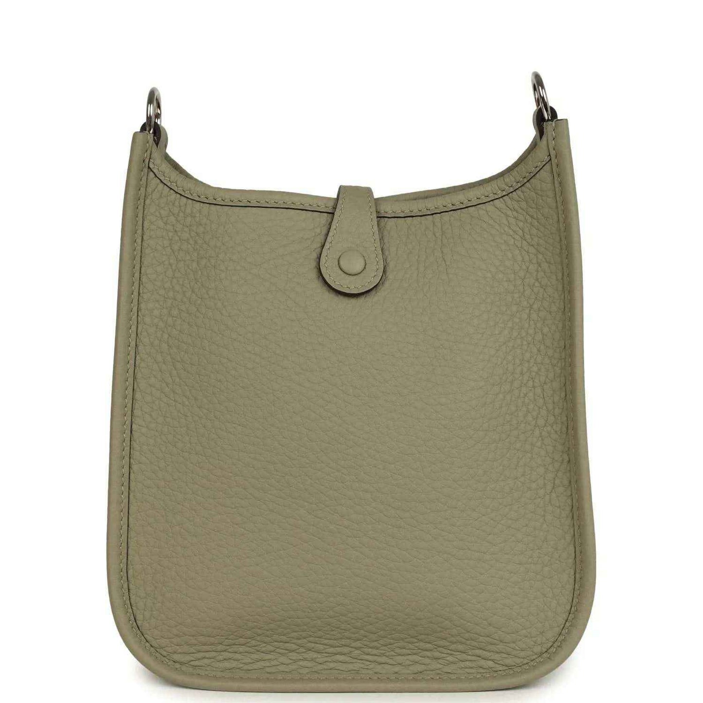 Sage green leather crossbody bag with top tab closure and silver-tone rings