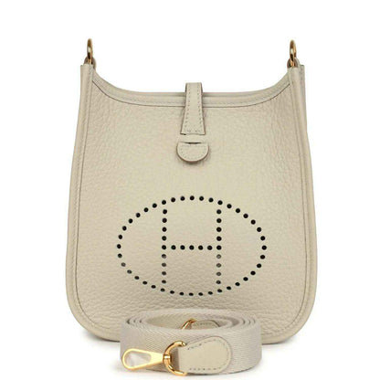 Hermes Evelyne TPM mini bag in light beige with dotted H logo and gold hardware