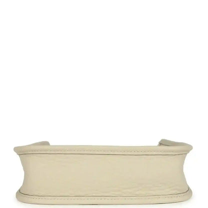 Hermes Evelyne TPM mini bag in light beige, top rim edge view