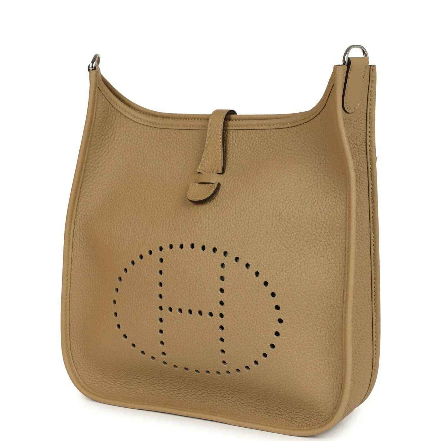Tan leather hobo crossbody bag with perforated logo on the front panel