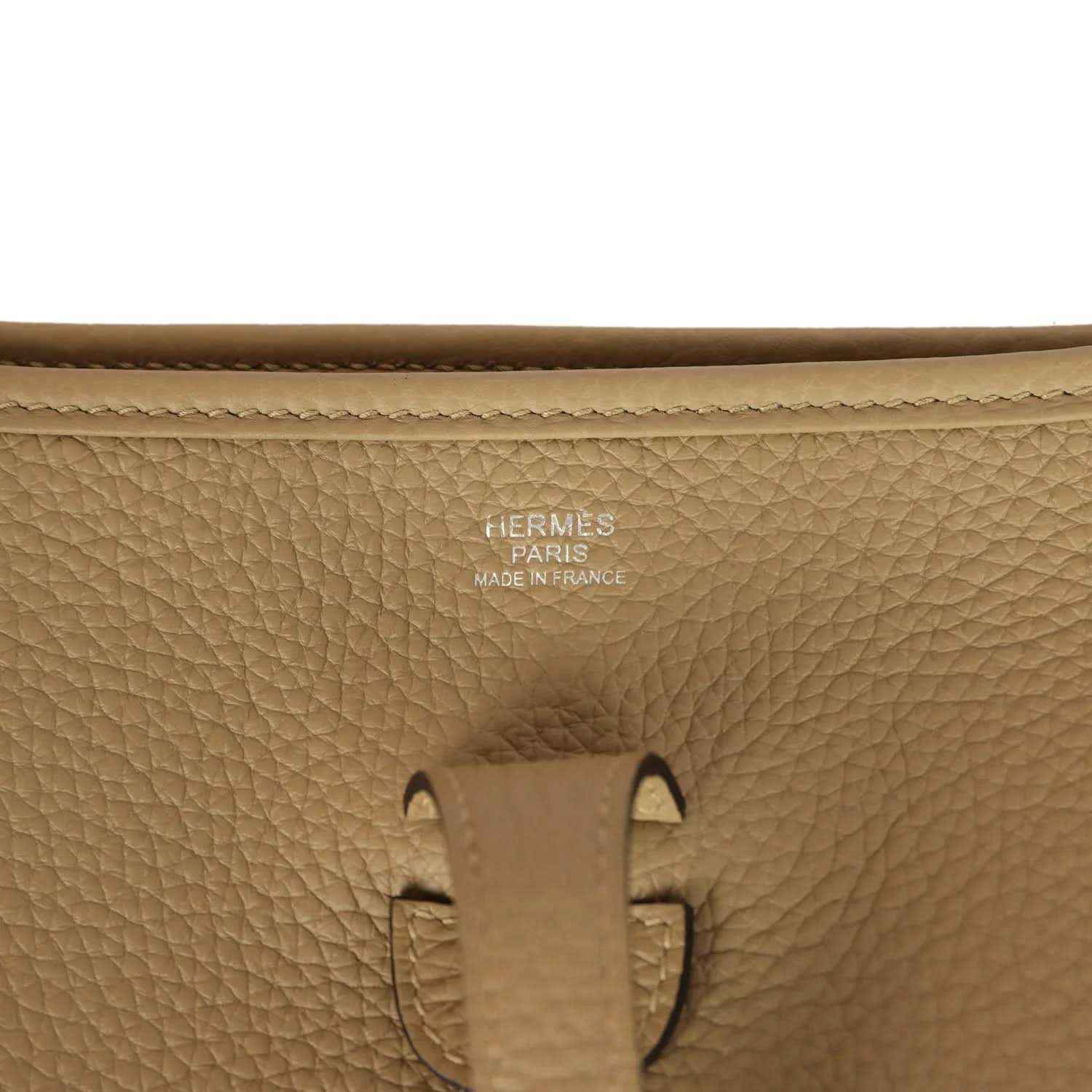 Tan leather bag stamp detail: HERMES PARIS MADE IN FRANCE
