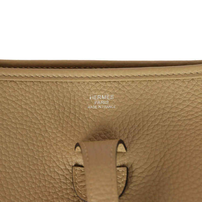 Tan leather bag stamp detail: HERMES PARIS MADE IN FRANCE